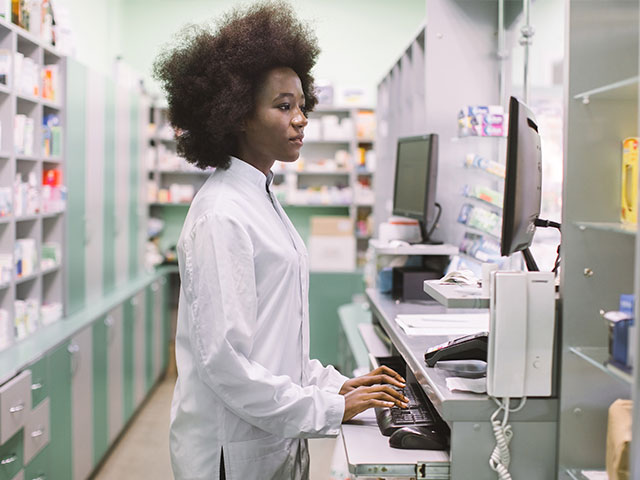 Female student working in pharmacy