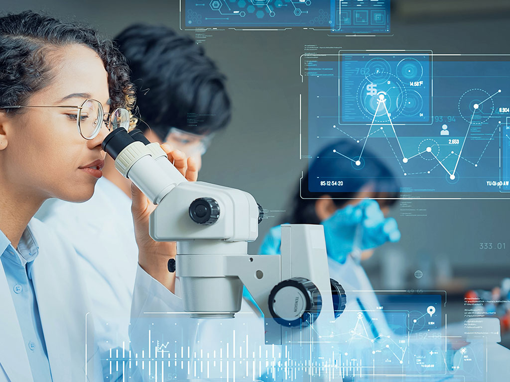 Pharmacist looking through microscope