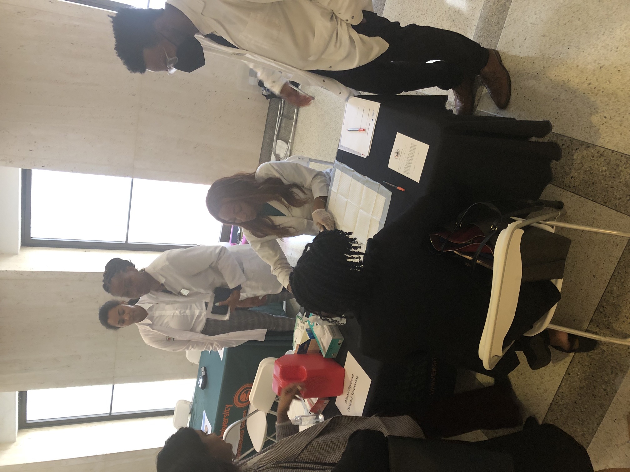 Student pharmacists participating in the health fair event image