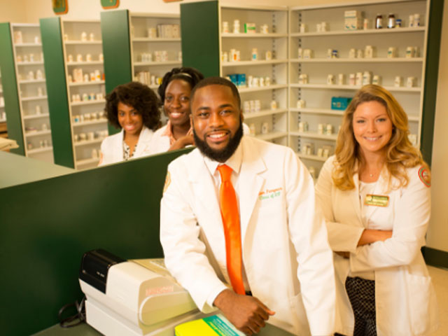 Pharmacy workers in lab