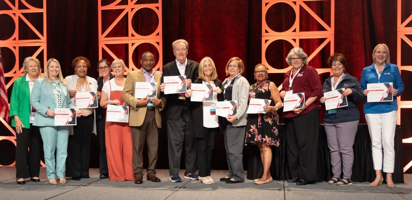 Pictured sixth from left is Dr. James L. Moran, Jr., recipient of the 2024 National Legacy Award for his proven leadership skills and dedication to the betterment and sustainability of SGMP at the National Education Conference held recently in Omaha, Nebraska.