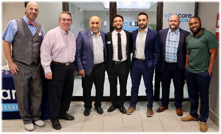 ctured in the middle at left, Dr. Darwish, along with his father, brother and several other FAMU PharmD alumni serve as staff at Vital Care.